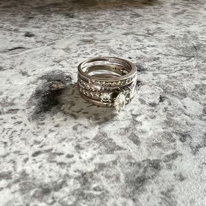 3 set of rings. Engagement. One year band and wedding band.